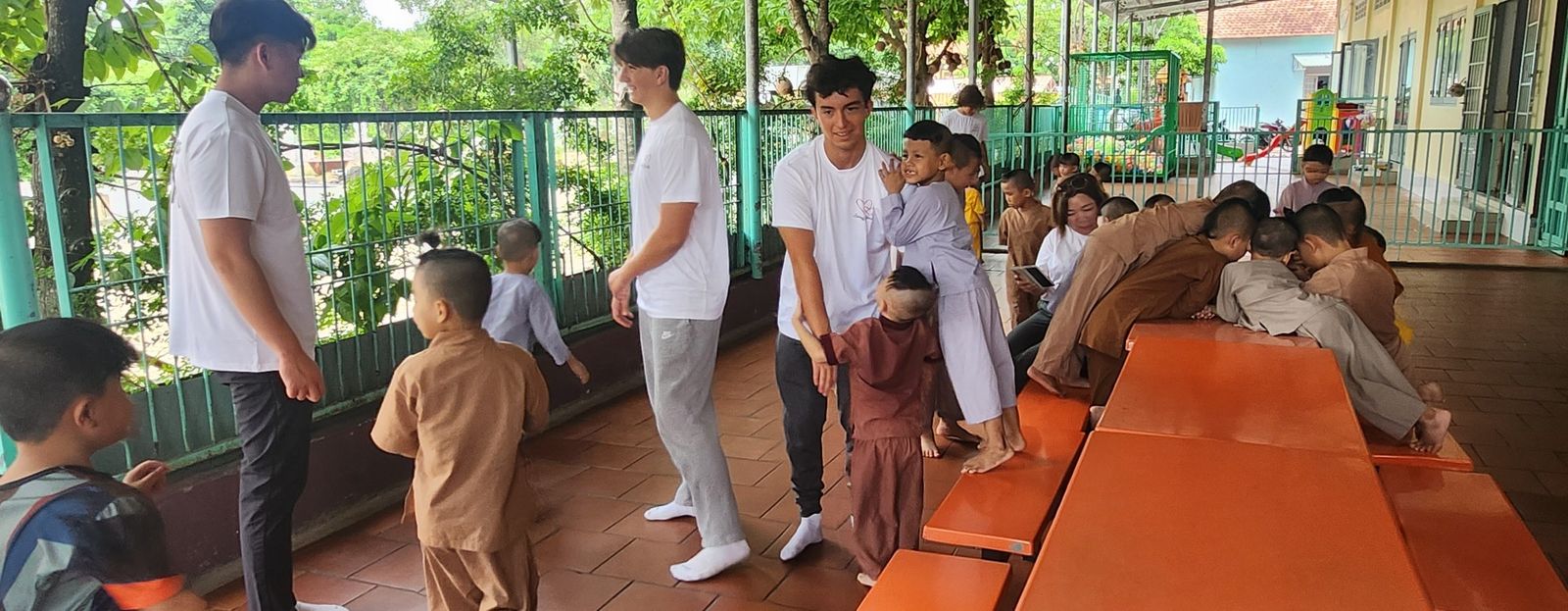 Hugging and playing with children at the orphanage